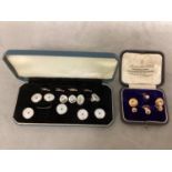 A set of 9ct white gold mother of pearl and sapphire dress studs and cufflinks in fitted box