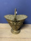 A large brass coal scuttle with acanthas leaf decoration with kite mark, in the manner of Benham &