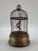 A Continental early C20th bird case Automaton, Clockwork mechanism, with gilt brass base, 28cmH