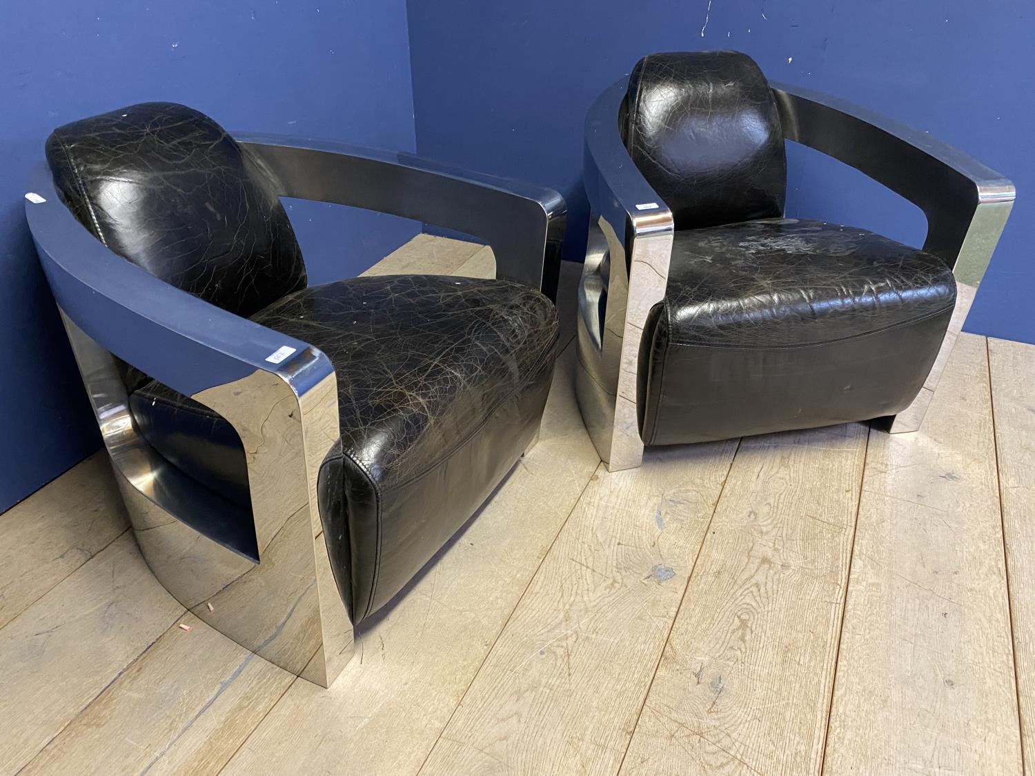 Pair of contemporary chrome and leather tub arm chairs, possibly 19702s/1980s, possibly Halo Mars or