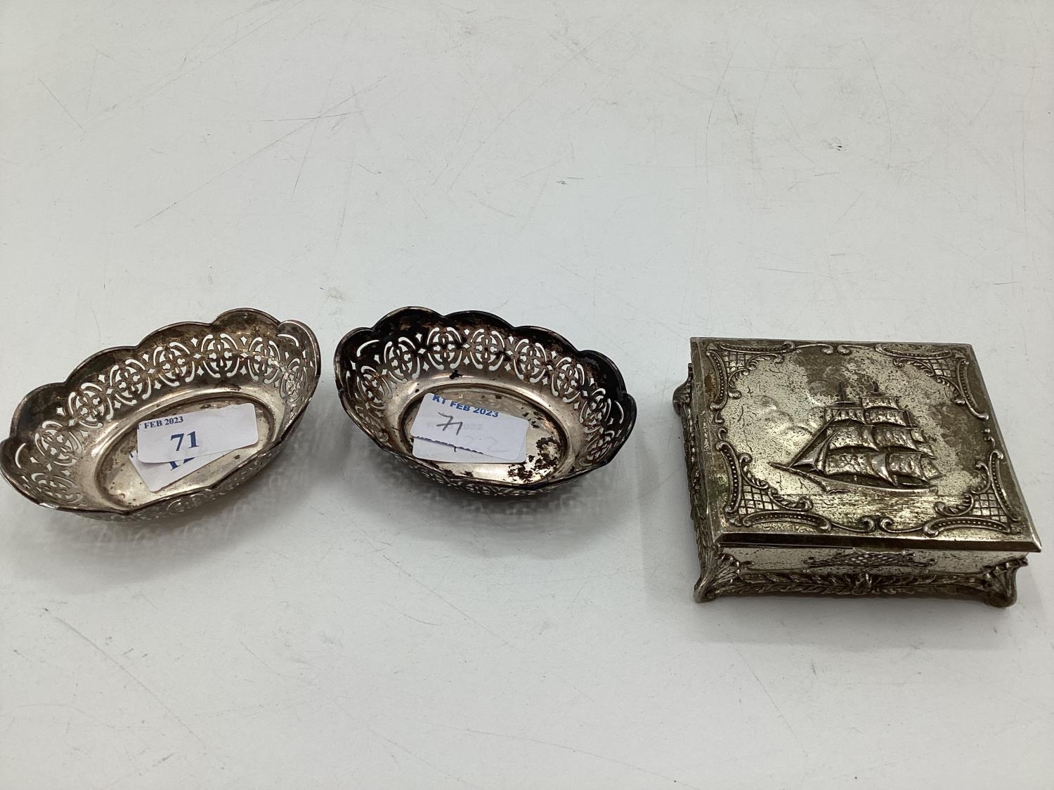 Pair of sterling silver oval pierced dishes and salts and a white metal trinket box