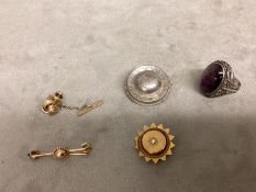 A collection of unmarked white and yellow metal jewellery