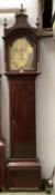 A longcase clock, brass arched vase, Roman numeral markers, signed RAINSFORD LEICESTER SQUARE,