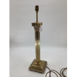A C20th brass column table lamp on square base, 66cmH