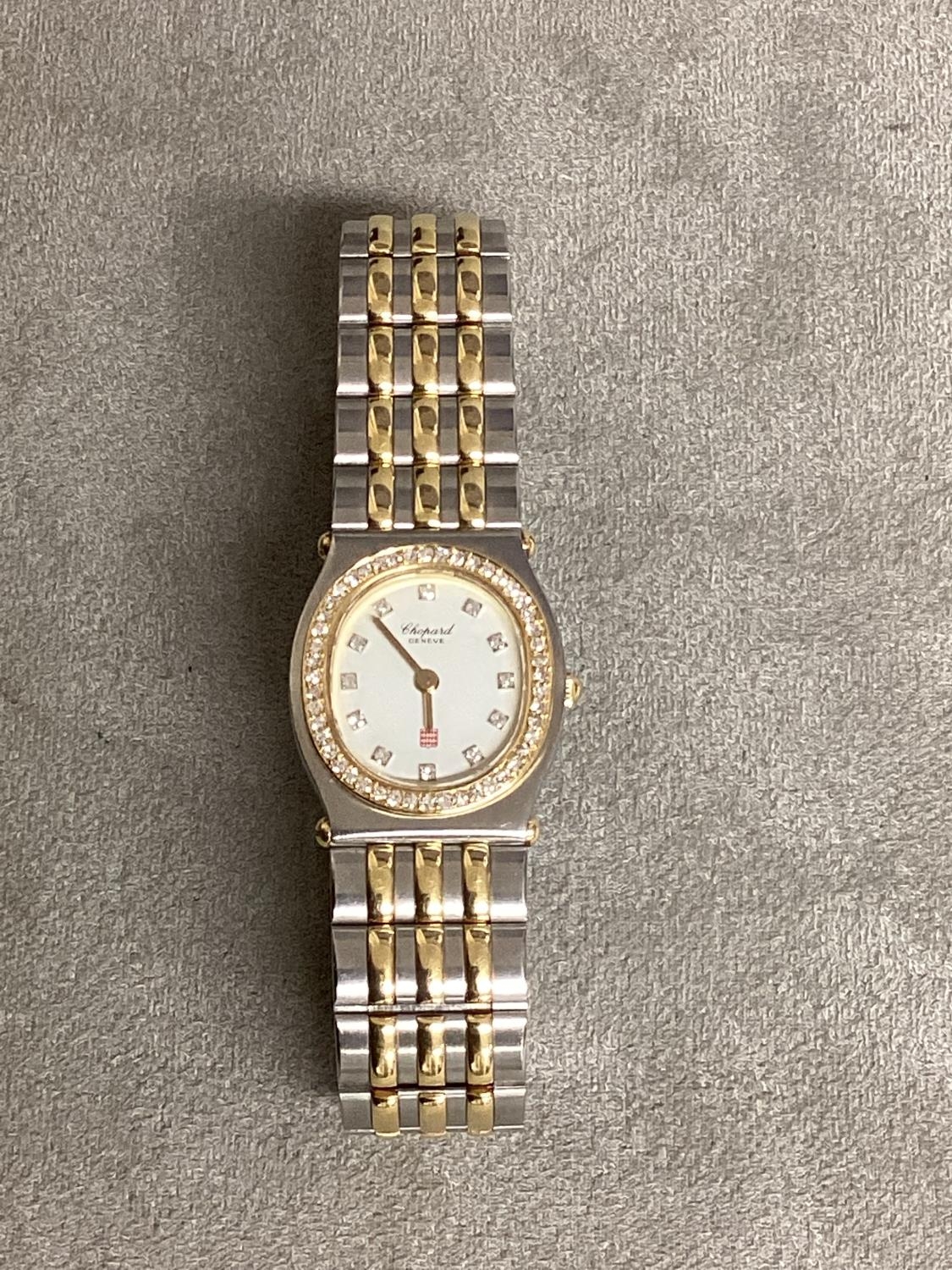 Chopard, an unmarked yellow and white metal ladies Monte Carlo watch, diamond set oval bezel with