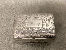 A sterling silver vinaigrette, chased decoration, fitted gilt metal interior, stamped TS Birmingham,