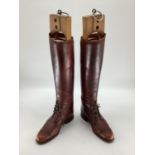 Pair of brown leather laced riding boots, with trees