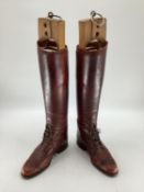 Pair of brown leather laced riding boots, with trees