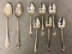 A set of six Sterling silver tea spoon, with scallop finials together with a pair of Sterling silver