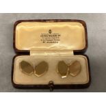 A pair of 9ct gold cuff links in fitted leather box .75g