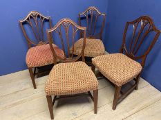 A set of 4 shield shaped back dining chairs, with red cheque upholstery, some general wear