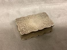 A Sterling silver pocket snuff box with chased decoration by Joseph Gloster, Birmingham 1899, 48g