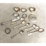 A collection of Sterling silver and white metal items to include compact, napkin ring, and other
