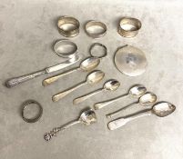 A collection of Sterling silver and white metal items to include compact, napkin ring, and other