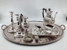 A large collection of silver plated and white metal items to include a large oval tray with loop