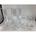 A quantity of decorative glass candlesticks