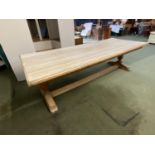 A very large heavy faded/bleached oak refectory table with stretcher to base, 258cm Long x103cm Wide