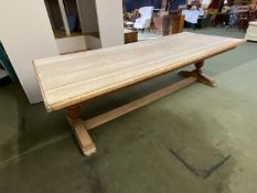 A very large heavy faded/bleached oak refectory table with stretcher to base, 258cm Long x103cm Wide