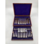 A boxed canteen of white metal cutlery