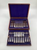 A boxed canteen of white metal cutlery