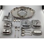 A large collection of silver plated wares to include a pierced galleried tray