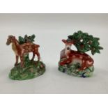 Two small Staffordshire flat back figures of deer 15cm & 13cm H