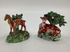 Two small Staffordshire flat back figures of deer 15cm & 13cm H