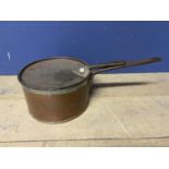A very large copper pan and lid, 32cm diameter