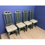 A set of 4 GRAHAM CARR green painted bergere high backed dining chairs with loose cream tie on
