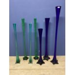 Seven tall narrow decorative glass flutes (were previously used by wedding flowers co) tallest 121cm