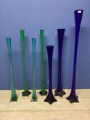 Seven tall narrow decorative glass flutes (were previously used by wedding flowers co) tallest 121cm