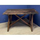 A plank top rustic oak table with X base, 116cmW x 78cm x 70cm, as found, on the lean