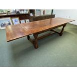 APOLOGIES - THIS LOT IS 560. A large heavy oak refectory style dining table,