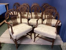 A good set of 12 (10+2 carvers) Chippendale style dining chairs with cream upholstery, 95cmH