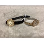 Two 9ct gold cased wristwatches one by Winegarten's
