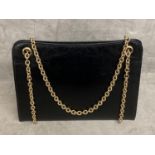 Cartier, a bespoke C20th leather handbag with 9ct gold mounts and yellow metal strap (relined by
