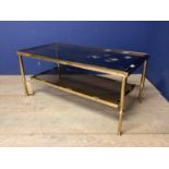 A Bbass and glass two tier coffee table