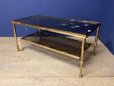 A Bbass and glass two tier coffee table