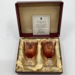 Boxed pair of Wedgwood glasses, "The Egyptian Chalices", with certificate