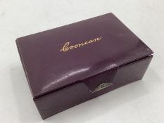 Red leather card boxed, by Asprey of London, gilt Cooncan game of cards, with sterling silver