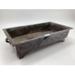 A rectangular Chinese style bronzed footed dish, some wear and losses, and marks to base