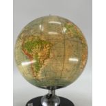 A mid century JRO globus, Munich, illuminated globe on turned ebonised stand, 38cmH