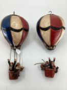 A pair of decorative papier Mache style hot air balloons, each 45cm H