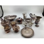 A collection of electroplated wares, to include tea pots, jugs etc