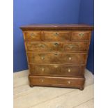 Mahogany & walnut chest of 3 short over 4 long graduated drawers on bun feet within a fitted