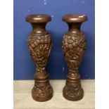 Pair of profusely carved oriental style hardwood floor vases, 79cmh, as found