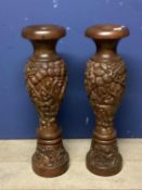 Pair of profusely carved oriental style hardwood floor vases, 79cmh, as found