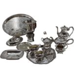 A collection of silver plated wares to include a Campana style wine cooler, a 3 piece tea set and