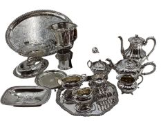 A collection of silver plated wares to include a Campana style wine cooler, a 3 piece tea set and