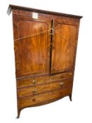 Large Regency flame mahogany two door wardrobe, with inset slides, and two short above